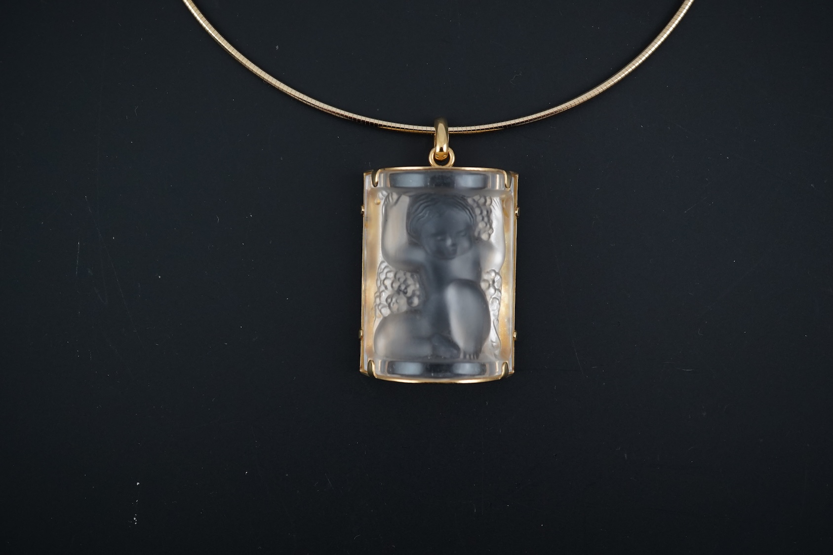 A Lalique Enfants pendant necklace, cased